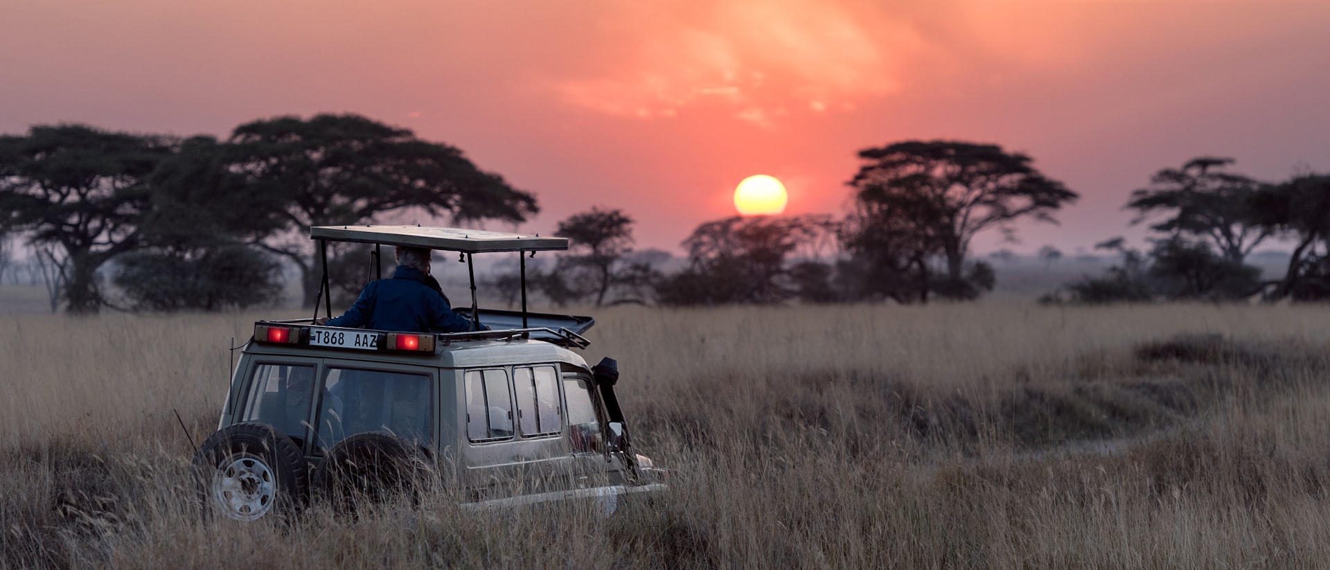 Luxury safari tent overlooking the East African savanna at golden hour