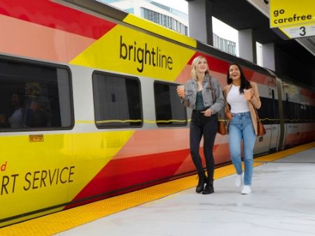 Brightline modern train at a sleek contemporary station