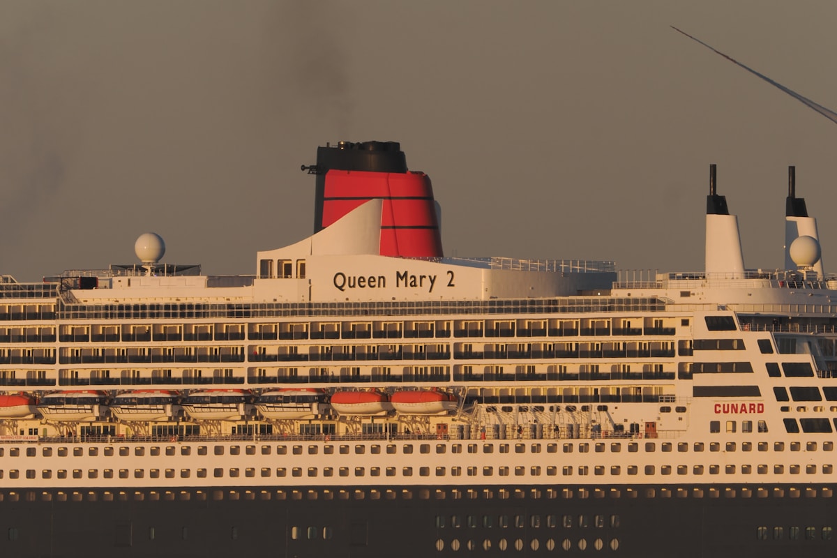 Classic ocean liner at sea with dramatic sky