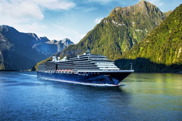 Holland America Line ship cruising through Alaska's glacier-lined Inside Passage