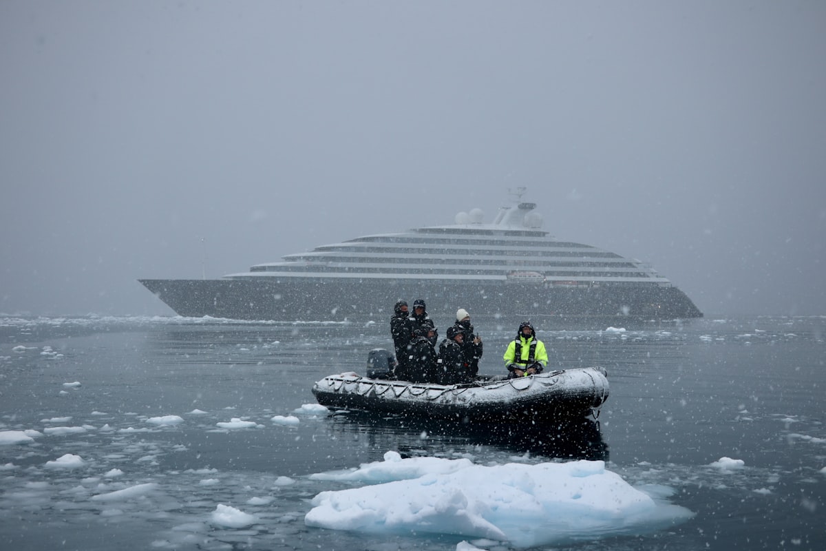 Expedition ship navigating through Antarctic ice
