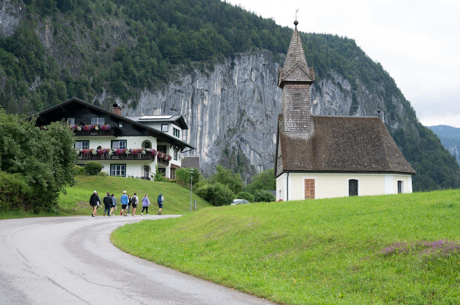 Small group of travelers exploring a European destination with a local guide