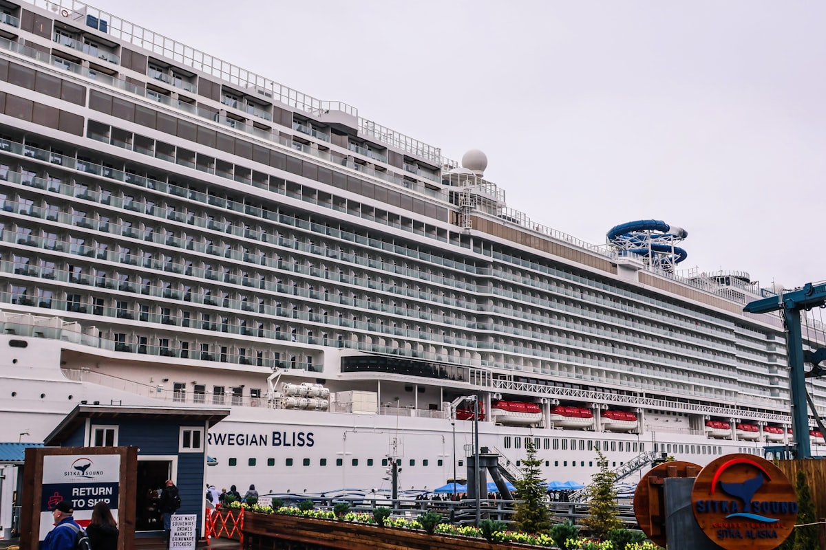Large cruise ship sailing through Caribbean blue waters